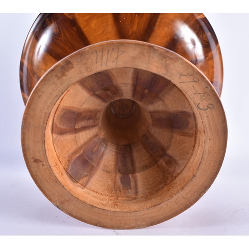 171 - AN ANTIQUE TREEN CARVED WOOD PEDESTAL DISH possibly Monkey Puzzle wood. 27 cm x 20 cm.