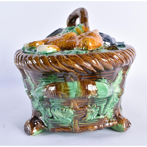 174 - A VICTORIAN MAJOLICA GAME TUREEN AND COVER modelled with dead game. 34 cm x 22 cm.