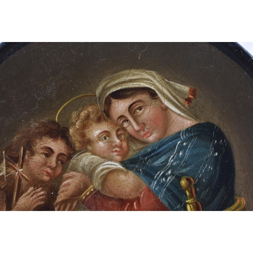 183 - AN EARLY 19TH CENTURY PAPIER MACHE SNUFF BOX AND COVER painted with Madonna and child with an attend... 