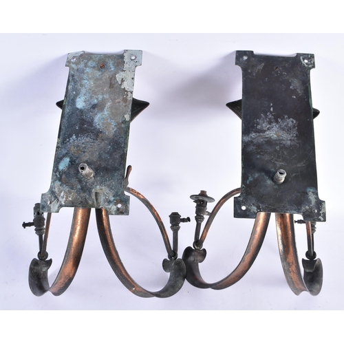 190 - A PAIR OF ARTS AND CRAFTS COPPER WALL SCONCES. 30 cm x 25 cm.