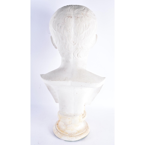 193 - A LARGE COUNTRY HOUSE PLASTER BUST OF JULIUS CAESAR upon a marble plinth. 55 cm x 25 cm.