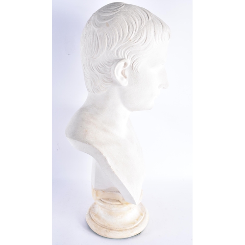 193 - A LARGE COUNTRY HOUSE PLASTER BUST OF JULIUS CAESAR upon a marble plinth. 55 cm x 25 cm.