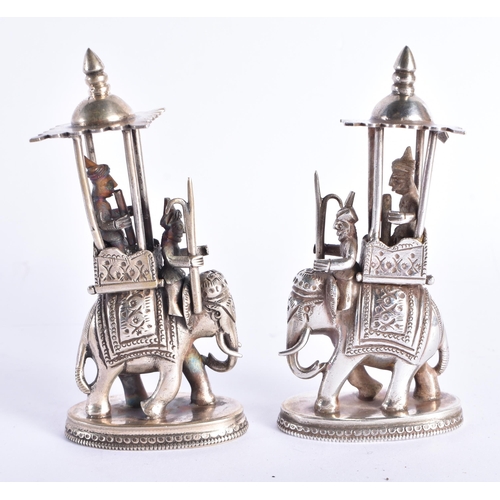 194 - A RARE 19TH CENTURY INDIAN SILVER CHESS SET including camels, horses, elephants and figures. 1300 gr... 