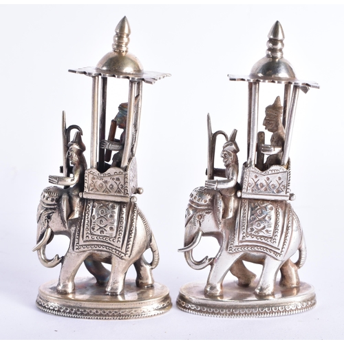 194 - A RARE 19TH CENTURY INDIAN SILVER CHESS SET including camels, horses, elephants and figures. 1300 gr... 