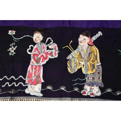 199 - A LARGE 19TH CENTURY CHINESE SILK EMBROIDERED PURPLE PANEL Qing, decorated with immortals. 155 cm x ... 