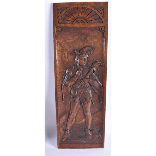 201 - A PAIR OF 19TH CENTURY ARTS AND CRAFTS CARVED WOOD PANELS decorated with a falconer and jester. 52 c... 