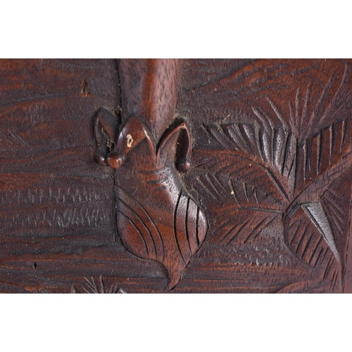 201 - A PAIR OF 19TH CENTURY ARTS AND CRAFTS CARVED WOOD PANELS decorated with a falconer and jester. 52 c... 