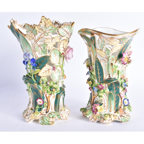 211 - TWO EARLY 19TH CENTURY COALPORT PORCELAIN ENCRUSTED VASES of naturalistic form. 18 cm high. (2)