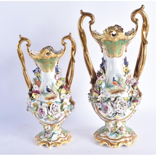 218 - TWO EARLY 19TH CENTURY ENGLISH PORCELAIN TWIN HANDLED VASES possibly Coalport, painted with birds. L... 