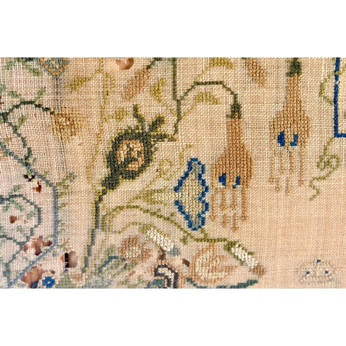 229 - A LARGE 19TH CENTURY FRAMED AND EMBROIDERED SAMPLER by Emma Twitchin aged 9 years. 58 cm square.