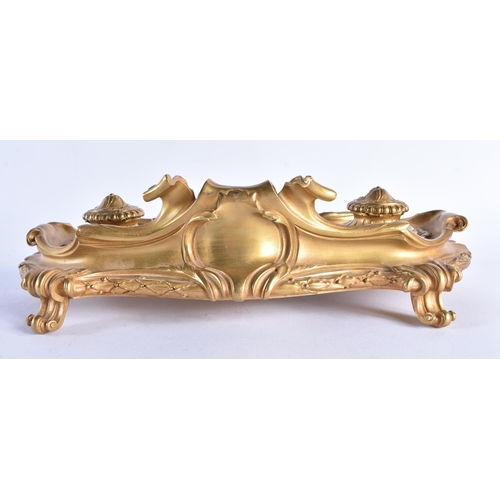 230 - A FINE EARLY 19TH CENTURY FRENCH ORMOLU AND MARBLE DESK STAND of scrolling rococo form. 28 cm x 18 c... 