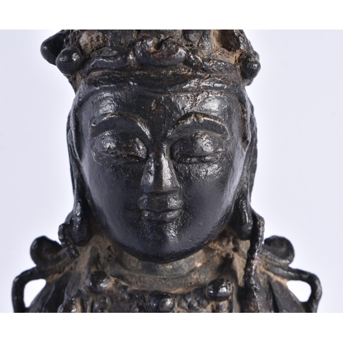 231 - A 17TH CENTURY CHINESE BRONZE FIGURE OF A BUDDHA Ming, modelled with one hand raised upon a lotus ca... 