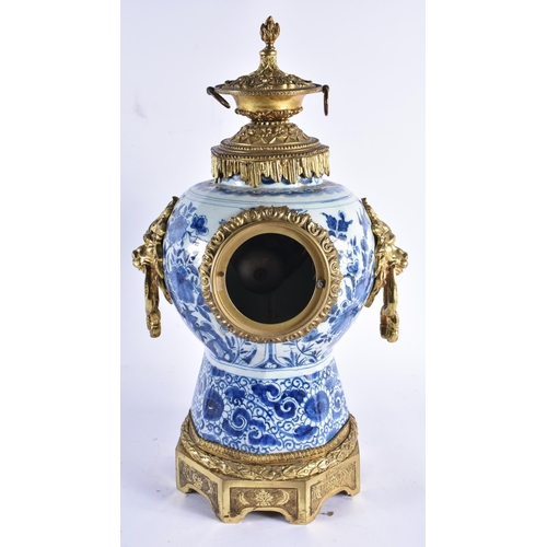 236 - AN 18TH CENTURY DELFT TIN GLAZED BLUE AND WHITE CLOCK with 19th century French bronze mounts. 48 cm ... 