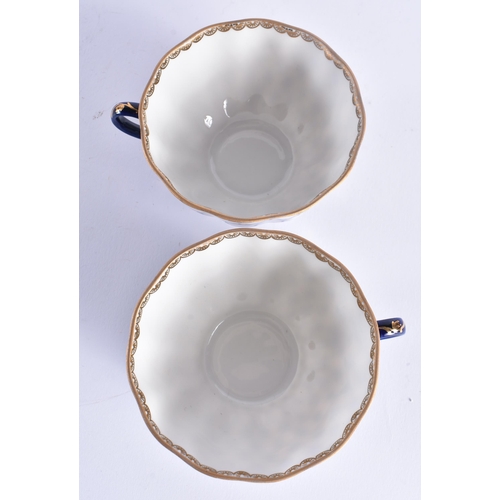 240 - A RUSSIAN ST PETERSBURG TEA FOR TWO SERVICE. Largest 18 cm wide. (7)