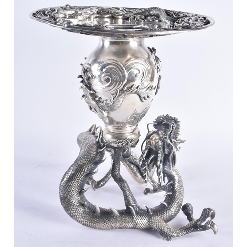 244 - A FINE AND RARE 19TH CENTURY JAPANESE MEIJI PERIOD SILVER DRAGON VASE decorated in relief with drago... 