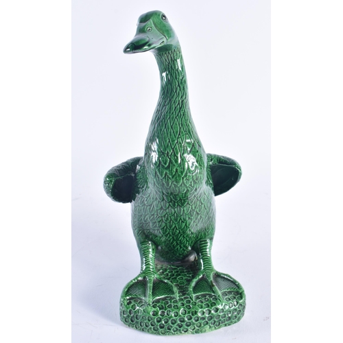 246 - A LARGE 19TH CENTURY CHINESE GREEN MONOCHROME PORCELAIN DUCK Kangxi style. 25.5 cm high.