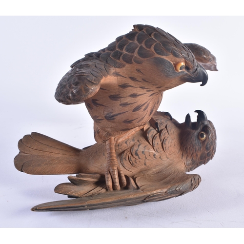 247 - A FINE 19TH CENTURY JAPANESE MEIJI PERIOD CARVED WOOD OKIMONO modelled as quarrelling hawks. 30 cm x... 