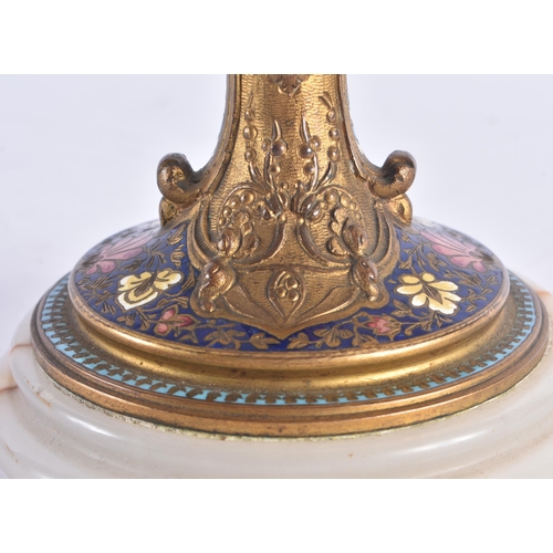 253 - A 19TH CENTURY FRENCH SEVRES PORCELAIN BRONZE AND CHAMPLEVE ENAMEL VASE painted with putti under rai... 