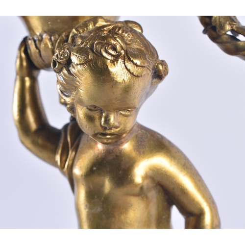 258 - A PAIR OF 19TH CENTURY FRENCH GILT BRONZE CANDLESTICKS modelled with nude figures. 38 cm high.