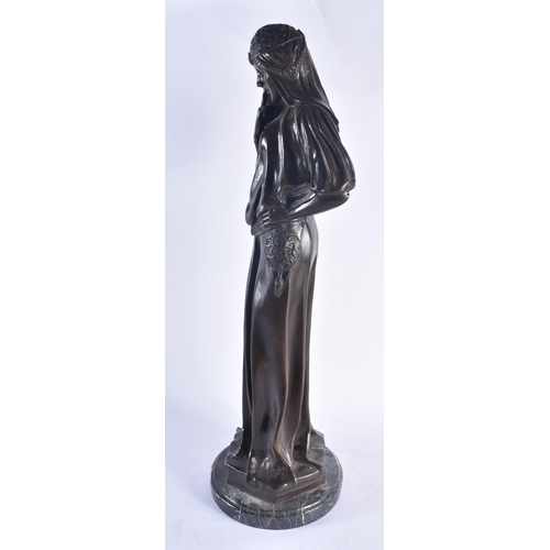 262 - A LARGE ART DECO FRENCH BRONZE FIGURE OF A STANDING FEMALE modelled in flowing robes. 61 cm high.