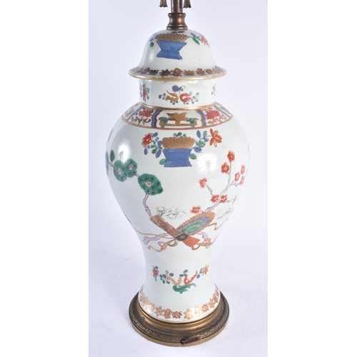 263 - A LARGE 19TH CENTURY FRENCH SAMSOMS OF PARIS ARMORIAL LAMP Chinese Export Manner. 58 cm high.