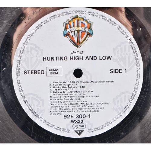 274 - AH  HA Hunting high and low, Norwegian platinum double disc presented to Warner Bros Andy Wickham t... 