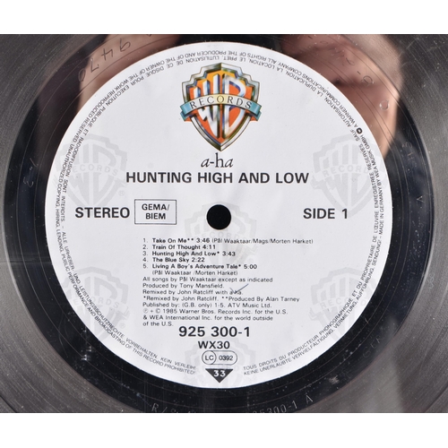 274 - AH  HA Hunting high and low, Norwegian platinum double disc presented to Warner Bros Andy Wickham t... 