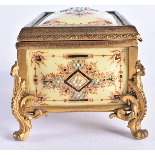 298 - AN UNUSUAL MID 19TH CENTURY FRENCH JEWELLED CREAMY GLASS CASKET decorated with turquoise and motifs.... 