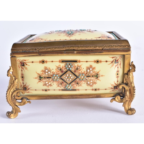 298 - AN UNUSUAL MID 19TH CENTURY FRENCH JEWELLED CREAMY GLASS CASKET decorated with turquoise and motifs.... 