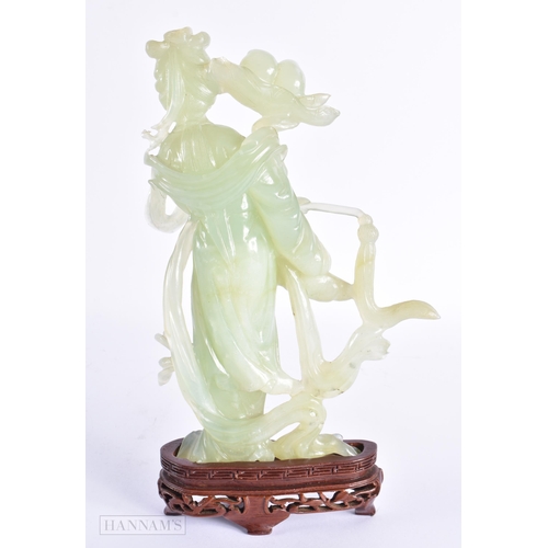 32 - A LARGE EARLY 20TH CENTURY CHINESE CARVED JADE FIGURE OF AN IMMORTAL Late Qing. 27 cm x 12 cm.