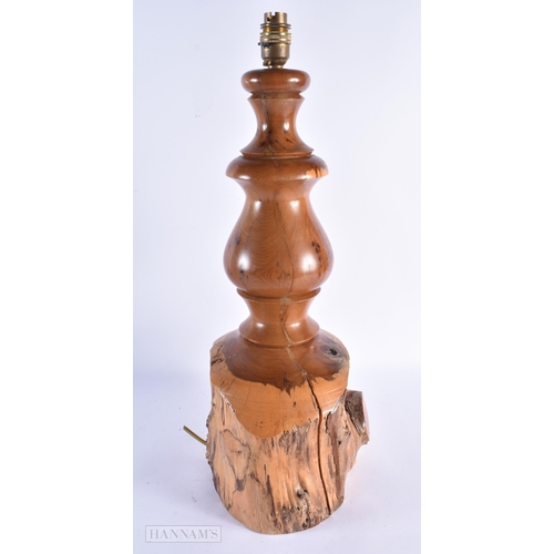 35 - A LARGE EARLY 20TH CENTURY YEW WOOD RUSTIC LAMP of naturalistic form. 52 cm x 22 cm.