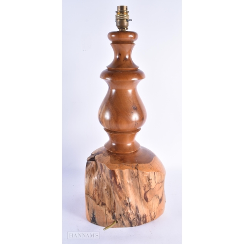 35 - A LARGE EARLY 20TH CENTURY YEW WOOD RUSTIC LAMP of naturalistic form. 52 cm x 22 cm.