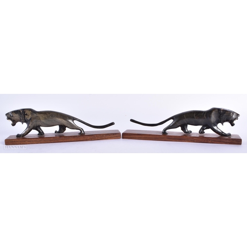 3 - A PAIR OF 19TH CENTURY MIDDLE EASTERN CARVED RHINOCEROS HORN LIONS together with an antique Indian b... 