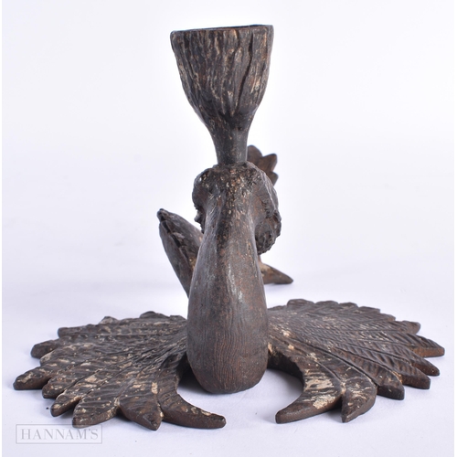 45 - A RARE 19TH CENTURY RUSSIAN CAST IRON GROTESQUE CHAMBERSTICK formed with a mythical caryatid beast. ... 