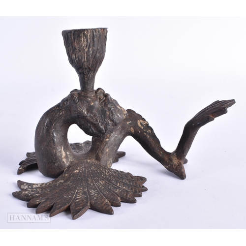 45 - A RARE 19TH CENTURY RUSSIAN CAST IRON GROTESQUE CHAMBERSTICK formed with a mythical caryatid beast. ... 