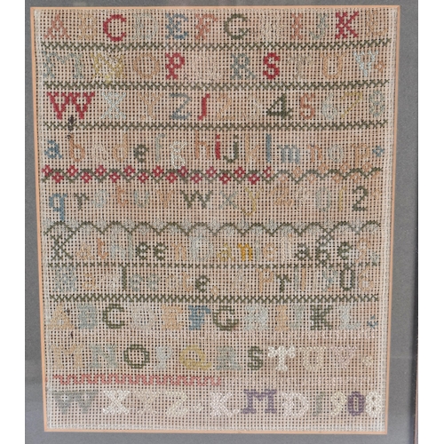 450 - THREE ANTIQUE EMBROIDERED SAMPLER. Largest 42 cm x 34 cm. (3)