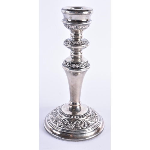 478 - A PAIR OF 1960S SILVER CANDLESTICKS. Birmingham 1966. 940 grams overall. 19 cm high.