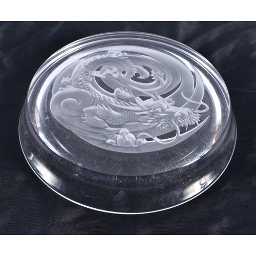 479 - A LALIQUE GLASS DRAGON DISH. 13 cm diameter.