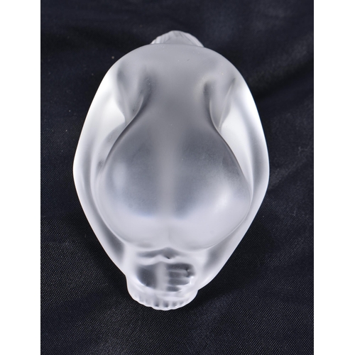 481 - A LALIQUE GLASS SLEEPING NUDE. 8 cm wide.