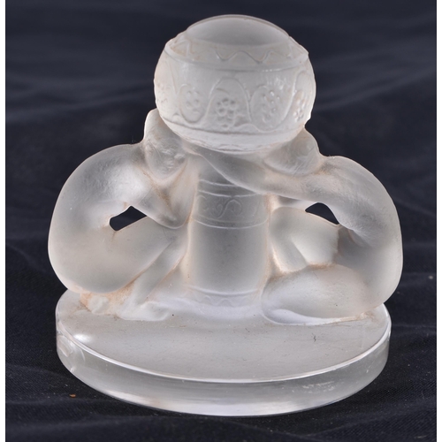 482 - A LALIQUE GLASS DOUBLE FEMALE FIGURE. 6 cm high.