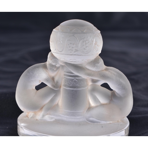 482 - A LALIQUE GLASS DOUBLE FEMALE FIGURE. 6 cm high.