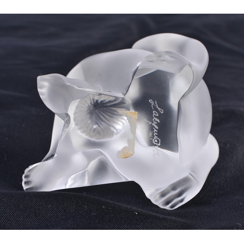 484 - A LALIQUE GLASS NUDE. 6.75 cm high.