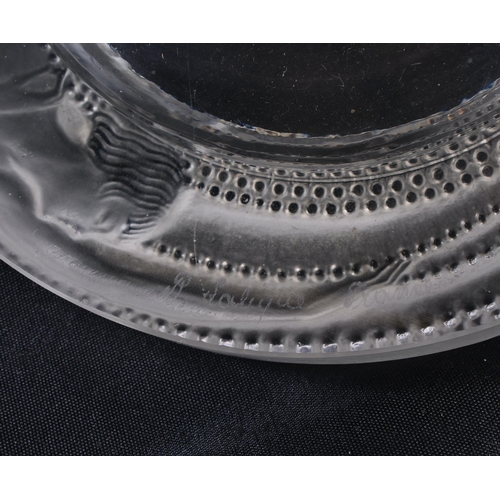 488 - A LALIQUE GLASS NUDE TENTACLE DISH. 13.5 cm diameter.