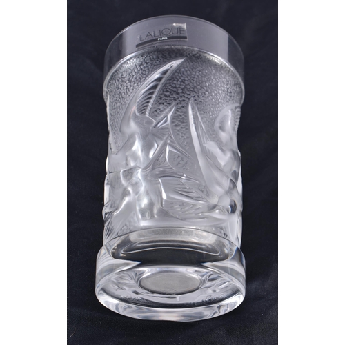 490 - A LALIQUE GLASS BIRD TUMBLER. 12 cm high.