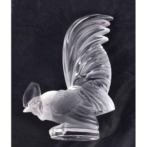 493 - A LALIQUE GLASS HEN. 21 cm high.