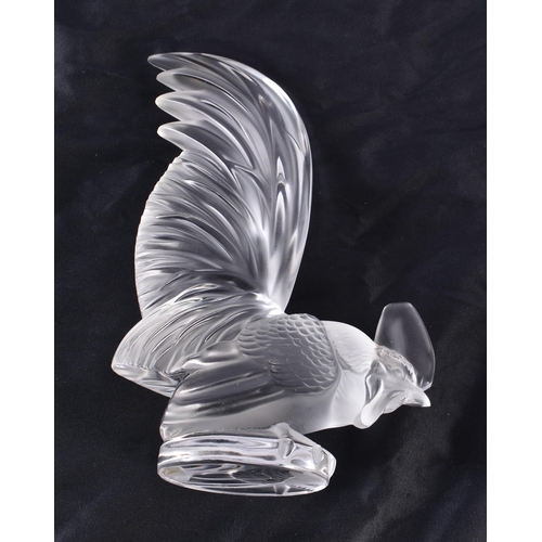 493 - A LALIQUE GLASS HEN. 21 cm high.