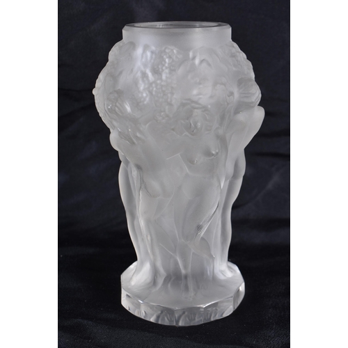 497 - A FROSTED GLASS NUDE VASE. 13 cm high.