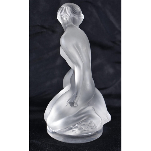 498 - A LALIQUE GLASS NUDE AND SWAN. 11.5 cm high.