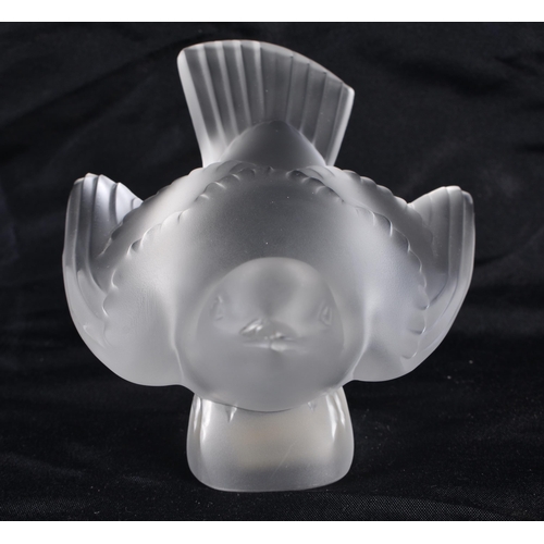 501 - A LALIQUE GLASS BIRD. 11 cm wide.