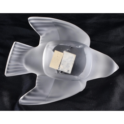 501 - A LALIQUE GLASS BIRD. 11 cm wide.